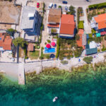 Doppelhaushälfte direkt am Meer ?iovo